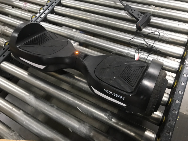 Photo 1 of Hover-1 Drive Electric Hoverboard | 7MPH Top Speed, 3 Mile Range, Long Lasting Lithium-Ion Battery, 6HR Full-Charge, Path Illuminating LED Lights
