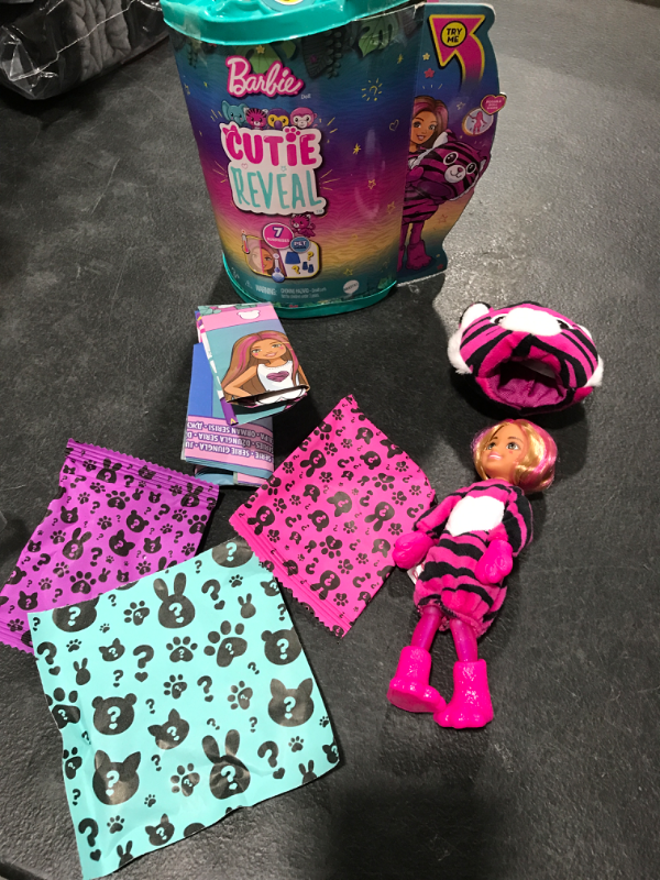 Photo 2 of Barbie Small Dolls and Accessories, Cutie Reveal Chelsea Doll with Tiger Plush Costume & 7 Surprises Including Color Change, Jungle Series