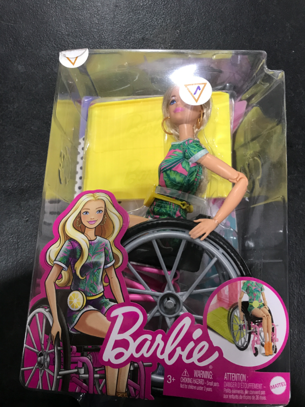 Photo 2 of Barbie Fashionistas Doll #165, with Wheelchair & Long Blonde Hair Wearing Tropical Romper, Orange Shoes & Lemon Fanny Pack, Toy for Kids 3 to 8 Years Old