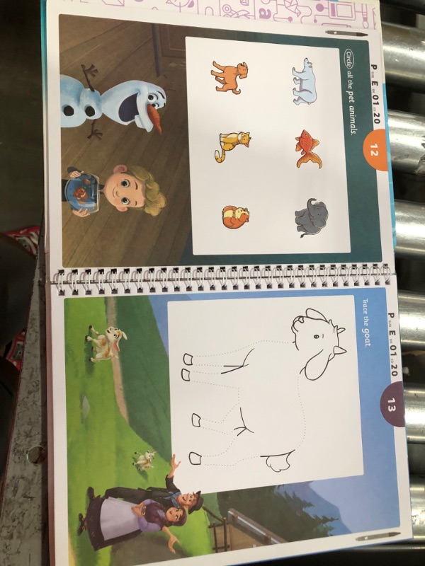 Photo 1 of child learning book