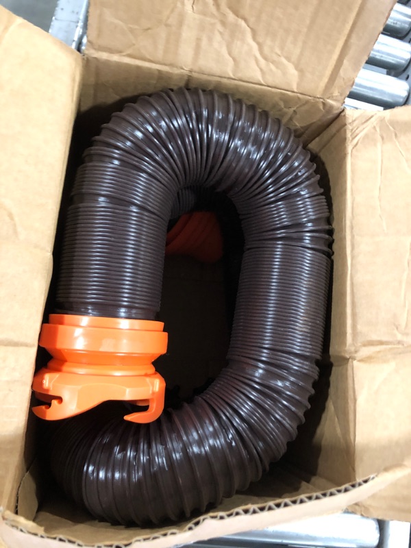 Photo 2 of Camco RhinoFLEX RV Sewer Hose Kit with Swivel Transparent Elbow and 4-in-1 Dump Station Fitting, Brown, 15 Feet (39770) 15ft Sewer Hose Kit Frustration-Free Packaging