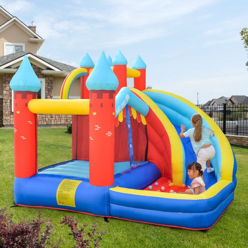 Photo 1 of Meland Kids Bounce House with Blower – Inflatable Jumper Bouncer for Kids Toddlers with Long Slide, Ball Pit & Heavy Duty Blower Outdoor Backyard Play Bounce with Long Slide & Ball Pit