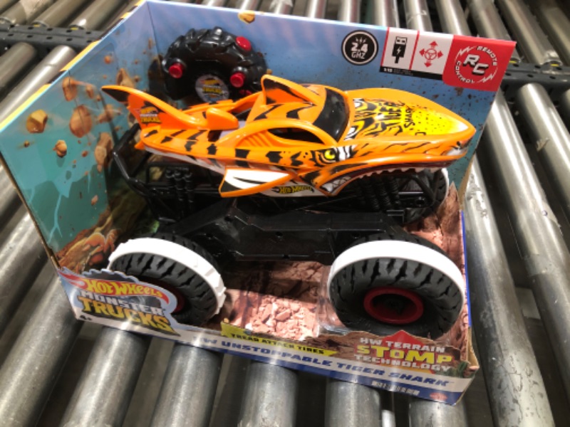 Photo 2 of Hot Wheels Monster Trucks, Remote Control Car, Monster Truck Toy with All-Terrain Wheels, 1:15 Scale Unstoppable Tiger Shark RC