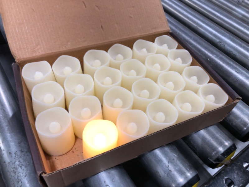 Photo 2 of SHYMERY Flameless Votive Candles,Flameless Flickering Electric Fake Candle,24 Pack 200+Hour Battery Operated LED Tea Lights in Warm White for Wedding,Table,Festival,Halloween,Christmas Decorations Warm White-24pack