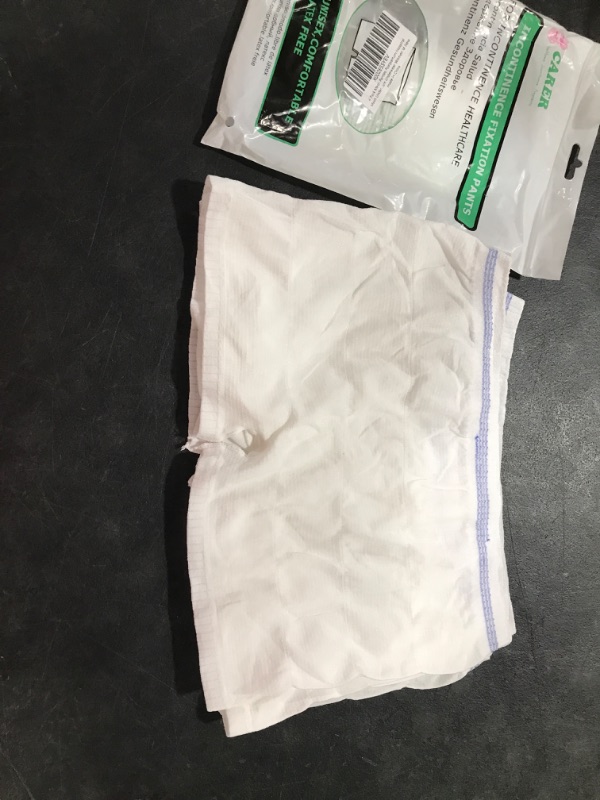 Photo 1 of Adult diapers - 3 pairs 