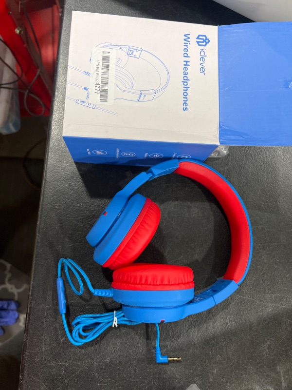 Photo 2 of iClever Kids Headphones for School Travel, Safe Volume 85/94dB, HD Mic Stereo Sound Over-Ear Girls Boys Headphones for Kid, FunShare Foldable 3.5mm Wired Kids Headphones for iPad Computer, HS19 Blue