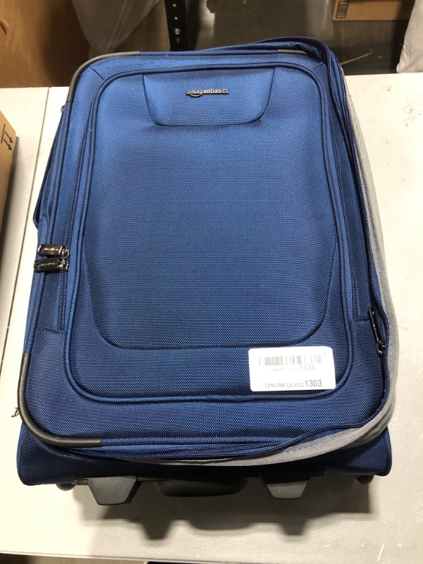 Photo 2 of Amazon Basics Softside Carry-On Luggage Suitcase With TSA Lock And Wheels - 54.86 cm, Blue 21.6-inch Blue