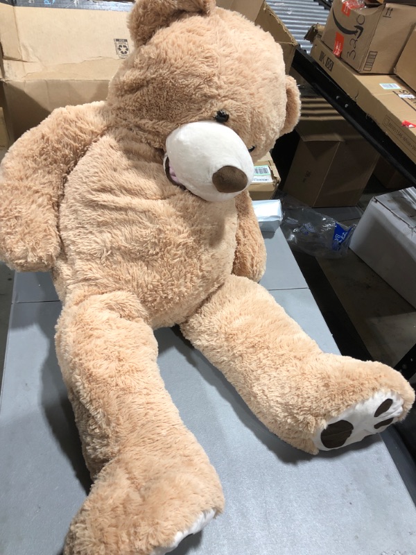 Photo 1 of DOLDOA Big Teddy Bear Stuffed Animals with Footprints Plush Toy for Girlfriend 51 inch (Brown)