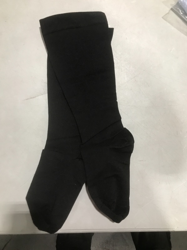 Photo 1 of black compression socks 