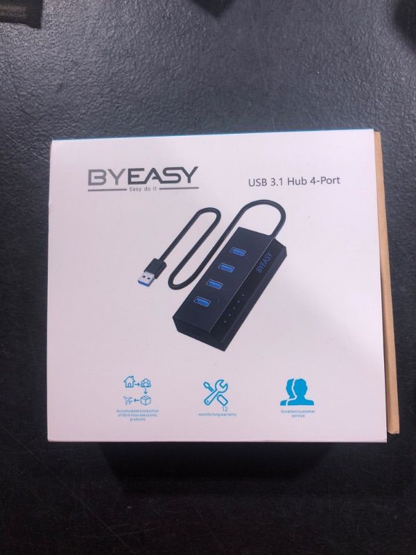 Photo 2 of BYEASY Powered USB Hub, 5-Port USB 3.0 Hub with 4 USB 3.0 Data Ports and 1 Type-C Smart Charging Port, USB Splitter with 5V/3A Power Adapter Compatible with MacBook, Laptop, PS4, Flash Drive