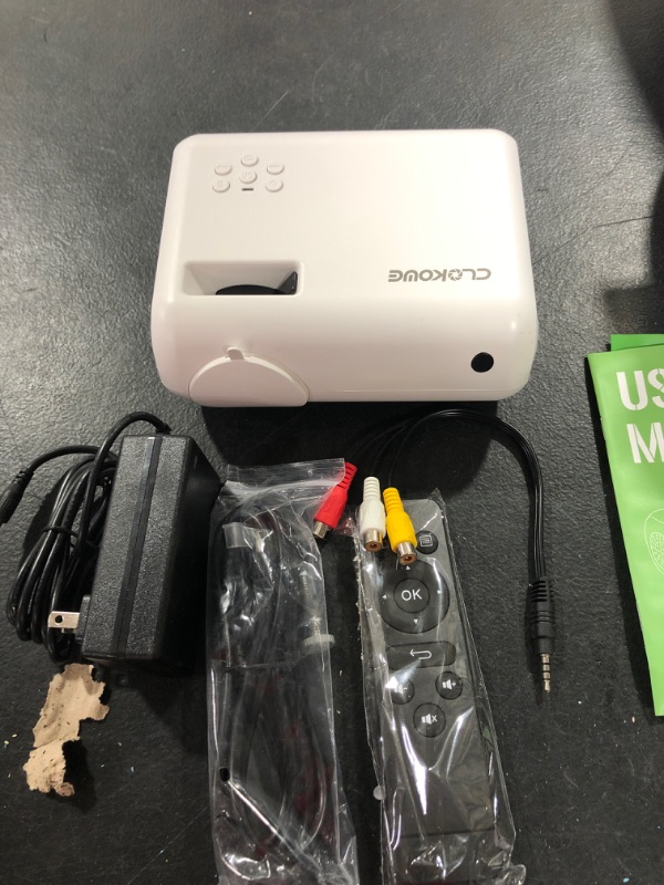 Photo 1 of Mini Projector, CLOKOWE 2023 Upgraded Portable Projector with 9000 Lux and Full HD 1080P, Movie Projector Compatible with iOS/Android Phone/Tablet/Laptop/PC/TV Stick/Box/USB Drive/DVD/Game Console