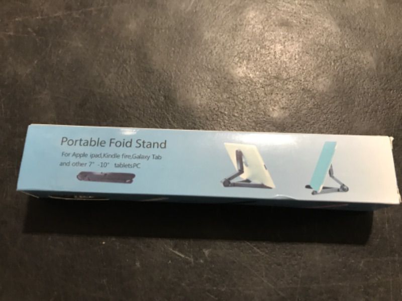 Photo 1 of Amazon Basics Adjustable Tablet Holder Stand - Compatible with Apple iPad, Samsung Galaxy and Kindle Fire Tablets, Portable, Black