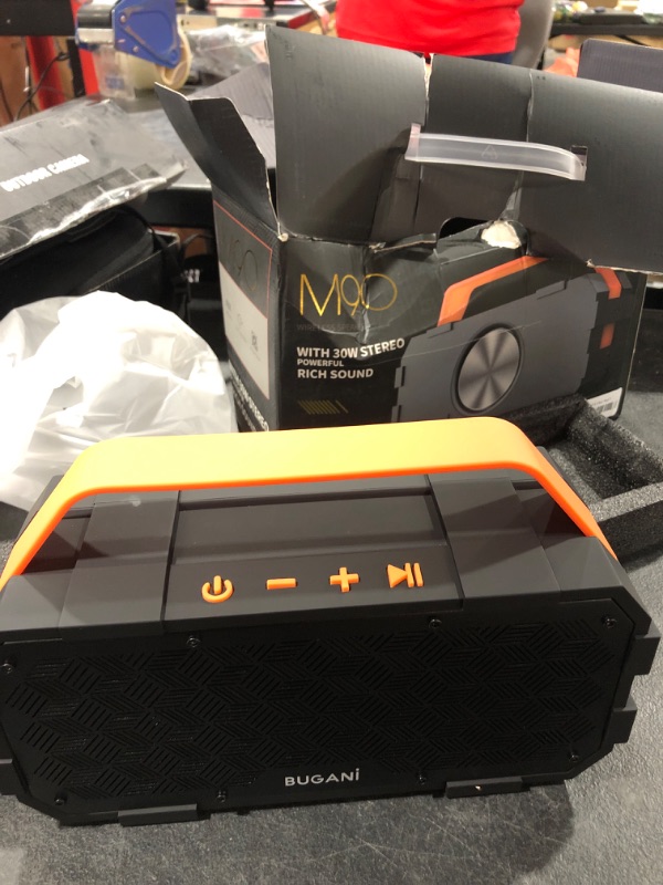 Photo 2 of Bluetooth Speaker, Bugani M90 Portable Bluetooth Speaker with 30W Stereo Sound and Deep Bass,Long-Term Playback,Bluetooth 5.0 100ft Wireless Range, Support TF Card/AUX, Built-in Mic, for Home. Orange