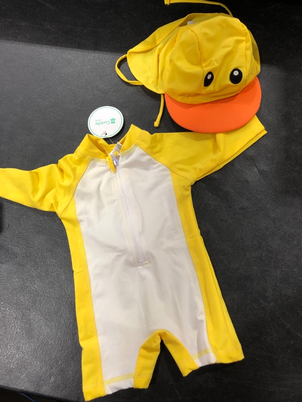 Photo 1 of Baby Swim suit and hat. Size 0-3M