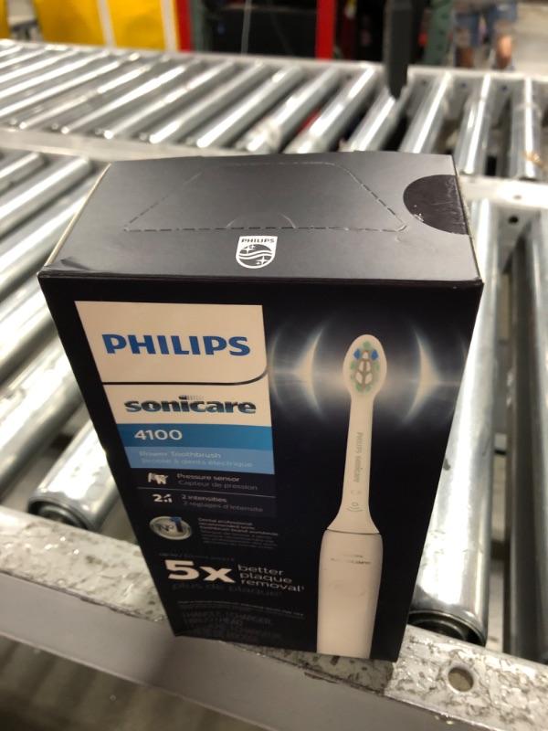 Photo 2 of Philips Sonicare 4100 Power Toothbrush, Rechargeable Electric Toothbrush with Pressure Sensor, White HX3681/23 White New 4100 - SEALED - 