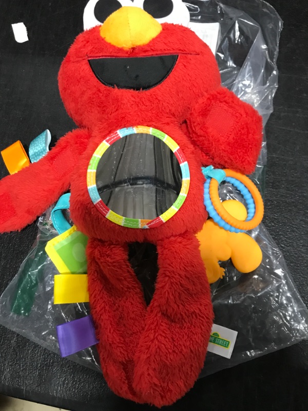 Photo 2 of Bright Starts Sesame Street Elmo Travel Buddy Plush Take-Along Stroller or Carrier Toy, Ages 0-12 Months
