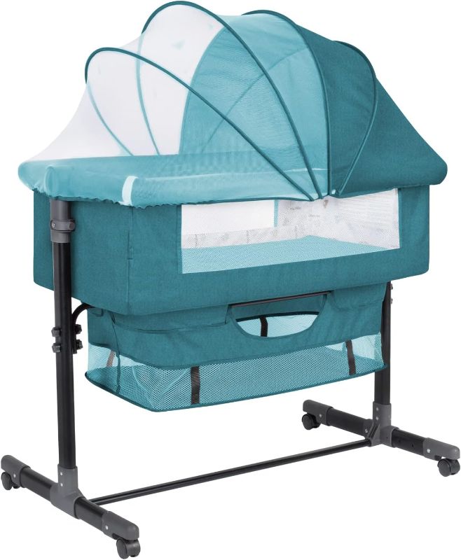 Photo 1 of GoFirst Bedside Bassinet for Baby, Bedside Sleeper with Wheels, Heigt Adjustable, with Mosquito Nets, Large Storage Bag, for Infant/Baby/Newborn (Blue)