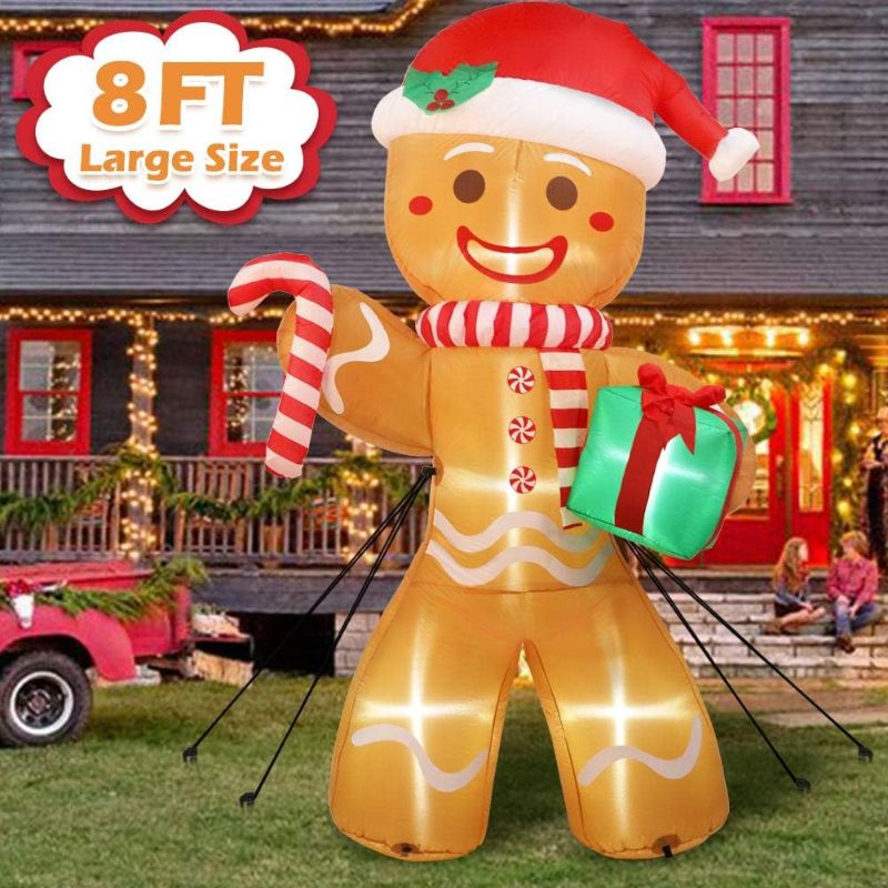 Photo 1 of  AerWo 8ft Christmas Inflatable Gingerbread Man, Christmas Blow Up Yard Decorations with Build-in LEDs, Inflatable Christmas Decorations Outdoor for The Yard, Lawn, Garden 