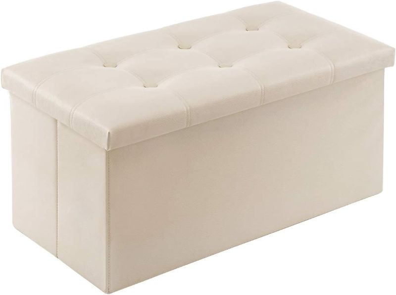 Photo 1 of 30 inches Folding Storage Ottoman, 80L Storage Bench for Bedroom and Hallway, Faux Leather White Beige Footrest with Foam Padded Seat