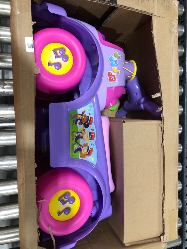 Photo 2 of Fisher Price Music Parade Purple Ride-On with 5 Different Marching Tunes! [Amazon Exclusive]