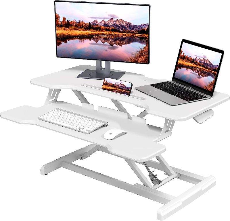 Photo 1 of JYLH JOYSEEKER Standing Desk Converter 30 Inches Sit Stand Desk Riser, Height Adjustable Sit Stand Desktop Riser Workstation for Home Office with Keyboard Tray for Laptop, White 