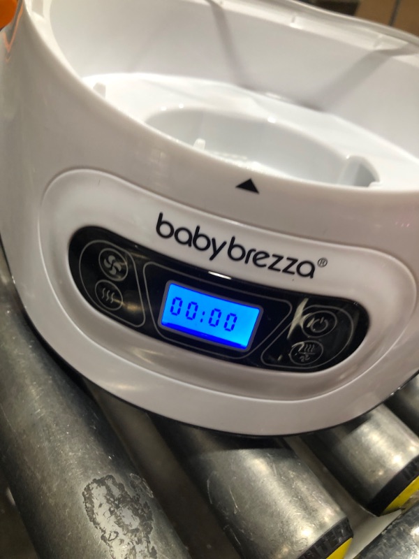 Photo 3 of Baby Brezza Baby Bottle Sterilizer and Dryer Machine – Electric Steam Sterilization - Universal Fit - Pacifiers, Glass, Plastic, and Newborn Feeding Bottles
