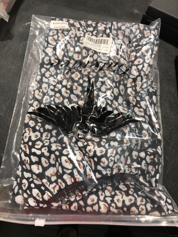 Photo 1 of BLACK AND WHITE FLORAL DRESS SIZE MEDIUM 