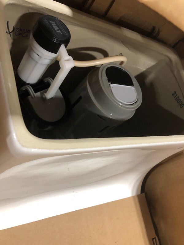 Photo 3 of 1-piece 1.1 GPF/1.6 GPF High Efficiency Dual Flush Elongated Toilet in White Slow-Close, Seat Included