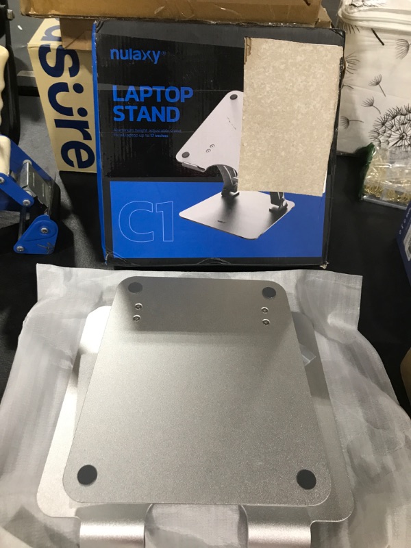 Photo 1 of Nulaxy Laptop Stand for Desk, Ergonomic Height Angle Adjustable Laptop Riser, 10-17" Up to 22 Lbs