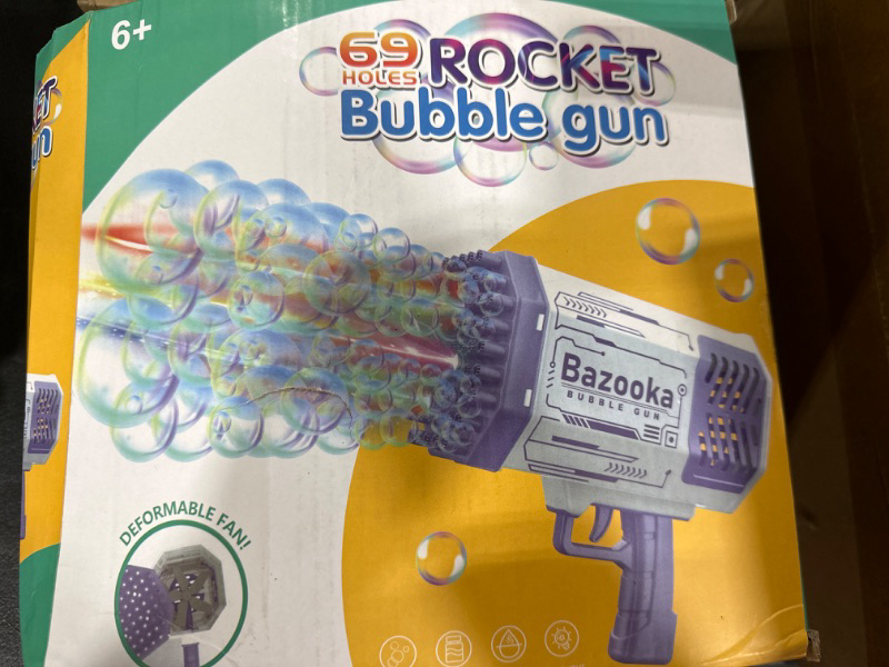 Photo 2 of 
Erice Bubble Gun, Bazooka Bubble Machine Gun with 69 Holes and Colorful Lights, Super Big Electric Automatic Bubble Maker Machine for Kids Adults SummeR