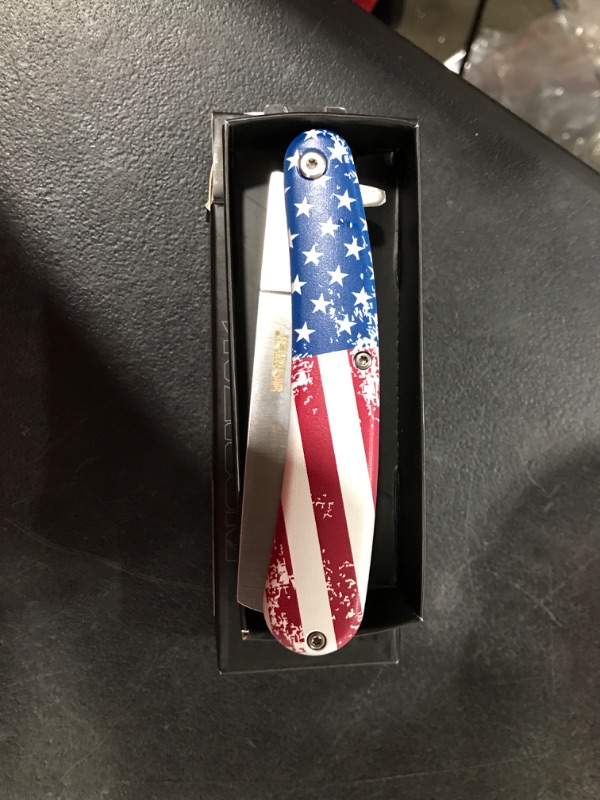 Photo 2 of Dispatch Tactical Folding Pocket Knife with Alumina Handle with Red Flag Pattern, Molybdenum Blade, and Rope Cutter Multifunction for Outdoors Hunting Camping Hiking EDC Tool