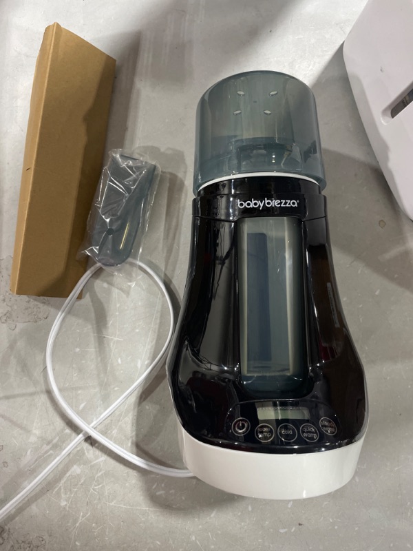Photo 1 of Baby Brezza Electric Baby Bottle Warmer, Breastmilk Warmer + Baby Food Warmer and Defroster - Universal Warmer Fits All Feeding Bottles: Glass, Plastic, Small, Large + Newborn – Digital Display Bottle + Breastmilk Warmer