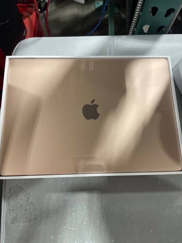 Photo 3 of Apple 2020 MacBook Air Laptop M1 Chip, 13" Retina Display, 8GB RAM, 256GB SSD Storage, Backlit Keyboard, FaceTime HD Camera, Touch ID. Works with iPhone/iPad; Gold 256GB Gold - FACTORY SEALED , OPENED FOR PICTURES 