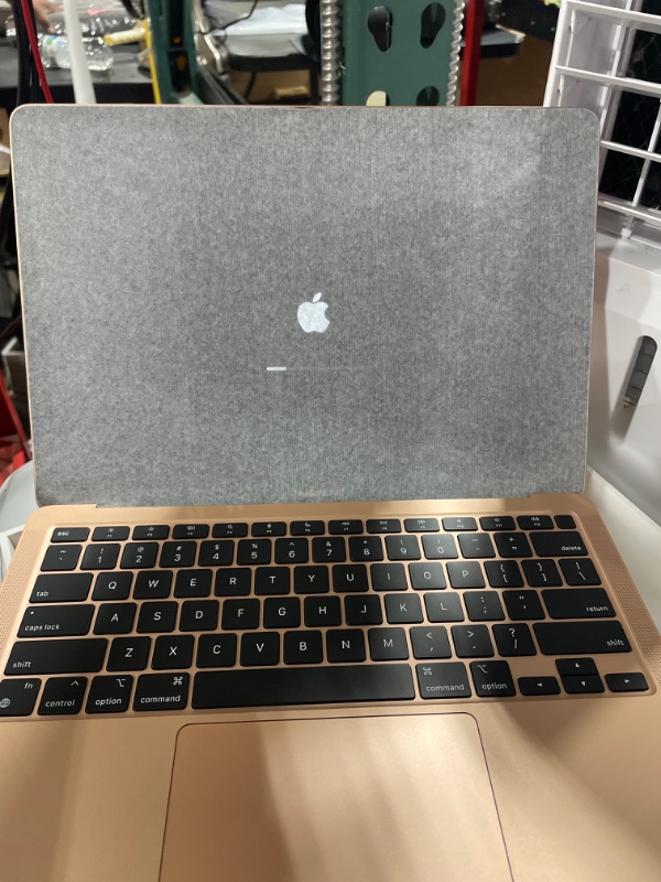 Photo 2 of Apple 2020 MacBook Air Laptop M1 Chip, 13" Retina Display, 8GB RAM, 256GB SSD Storage, Backlit Keyboard, FaceTime HD Camera, Touch ID. Works with iPhone/iPad; Gold 256GB Gold - FACTORY SEALED , OPENED FOR PICTURES 