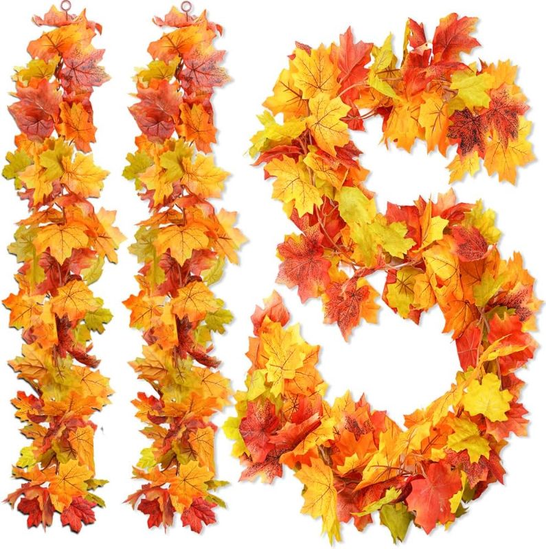 Photo 1 of 3 Packs Artificial Fall Leaves Garland, 5.9Ft/Pieces Autumn Maple Leaves Mantle Garland Hanging Vines for Home Decor Wedding Halloween Thanksgiving Christmas Indoor Outdoor Decorations 
