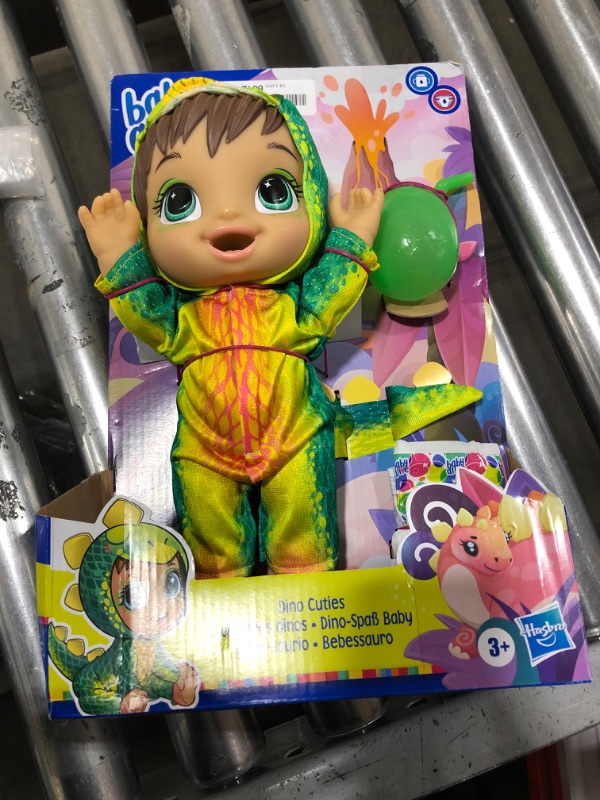 Photo 2 of Baby Alive Dino Cuties Doll Stegosaurus Drinks Wets Dinosaur Toy for Kids Ages 3 Years and up Brown Hair
