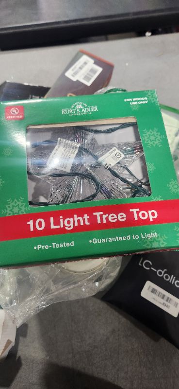 Photo 1 of 10 Light tree top