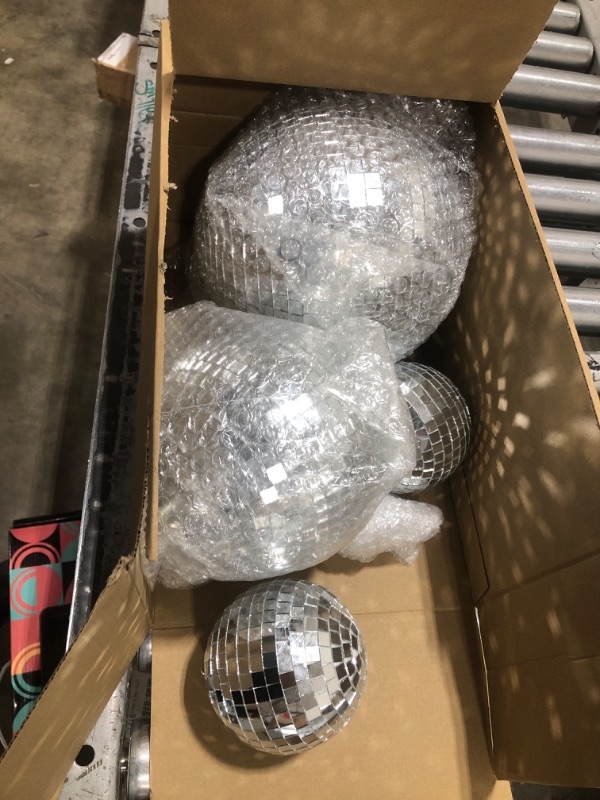 Photo 1 of 4 Pack Large Disco Ball Silver Hanging Disco Balls Reflective Mirror Ball Ornament for Party Holiday Wedding Dance and Music Festivals Decor Club Stage Props DJ Decoration (8 Inch, 6 Inch, 4 Inch)