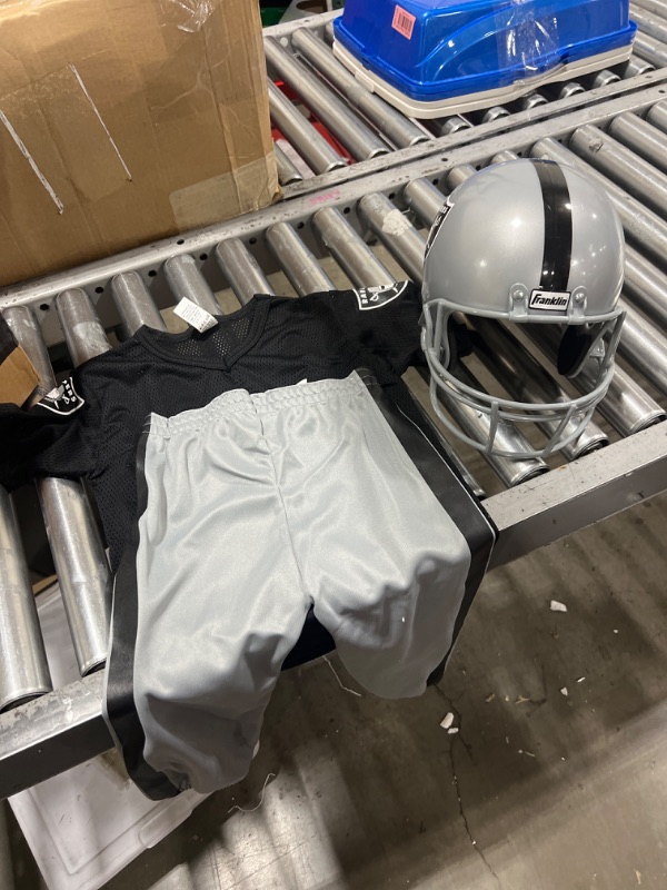 Photo 2 of Franklin Sports NFL Kids Football Uniform Set - NFL Youth Football Costume for Boys & Girls - Set Includes Helmet, Jersey & Pants Las Vegas Raiders Small