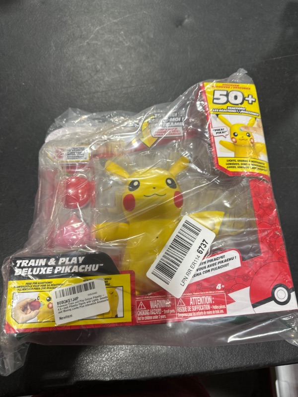 Photo 2 of Pokemon Train and Play Deluxe Pikachu - 4.5-Inch Pikachu Figure with Lights, Sounds, and Moving Limbs Plus Interactive Accessories