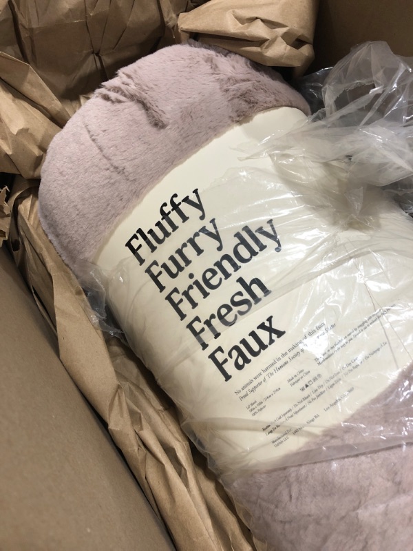 Photo 1 of UnHide Cuddle Puddle - Faux Fur Blanket - Oversized, Lightweight, Extra Soft Blanket - Machine Washable - Add a Layer of Softness to Any Bed or Couch - 100” x 100” - Rosy Baby