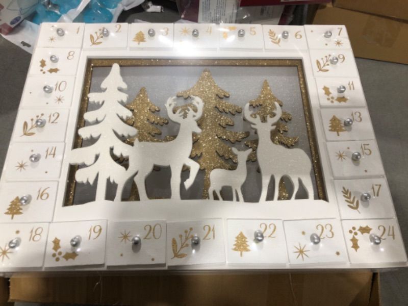 Photo 2 of Zcaukya Christmas Advent Calendar, Pre-lit LED Wooden Reindeer Christmas Advent Calendar with 24 Drawers, 24 Days Christmas Countdown Calendar Reindeer Wooden