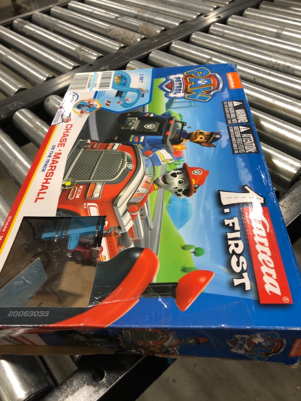 Photo 2 of Carrera First Paw Patrol - Slot Car Race Track - Includes 2 Cars: Chase and Marshall - Battery-Powered Beginner Racing Set for Kids Ages 3 Years and Up, Multi