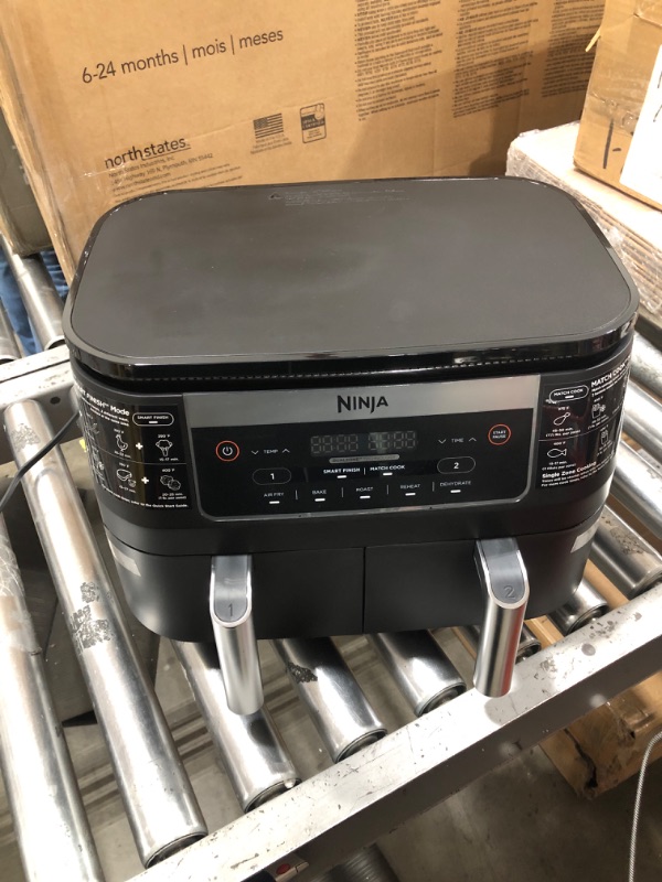 Photo 1 of Ninja DZ090 Foodi 6 Quart 5-in-1 DualZone 2-Basket Air Fryer with 2 Independent Frying Baskets, Match Cook & Smart Finish to Roast, Bake, Dehydrate & More for Quick Snacks & Small Meals, Black