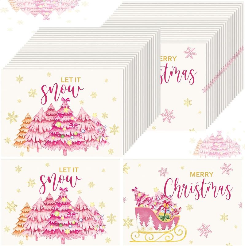 Photo 1 of 100 Pcs 14 Inches Pink Christmas Tree Let It Snow Snowflake Winter Placemats, Disposable Paper Seasonal Table Mats for Party Kitchen Dining Decoration
