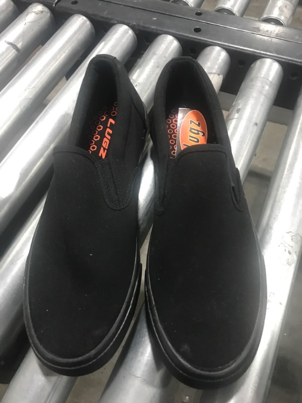 Photo 1 of BLACK SLIP ON SNEAKERS SIZE 9