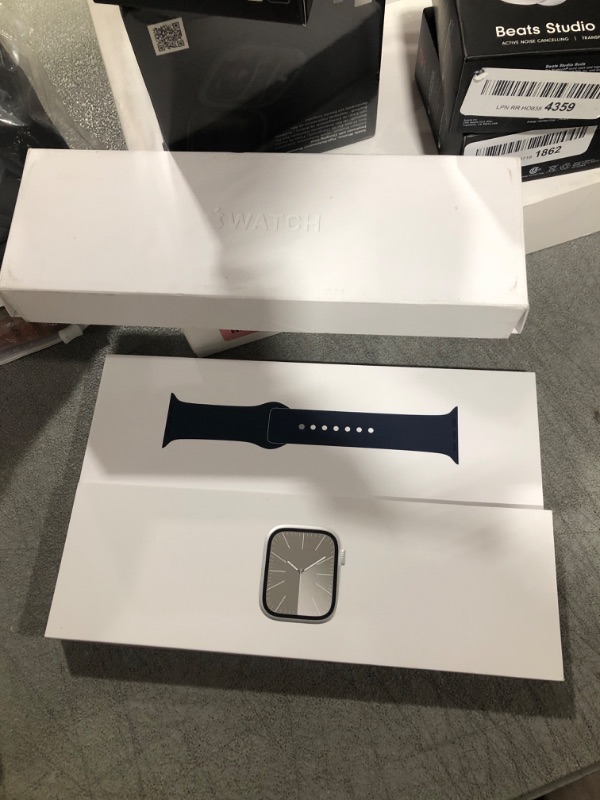 Photo 2 of Apple Watch Series 9 [GPS + Cellular 41mm] Smartwatch with Silver Stainless Steel Case with Storm Blue Sport Band S/M with AppleCare+ (2 Years) Silver Stainless Steel w Storm Blue Sport Band 41mm S/M - fits 130–180mm wrists With AppleCare+ (2 Years)