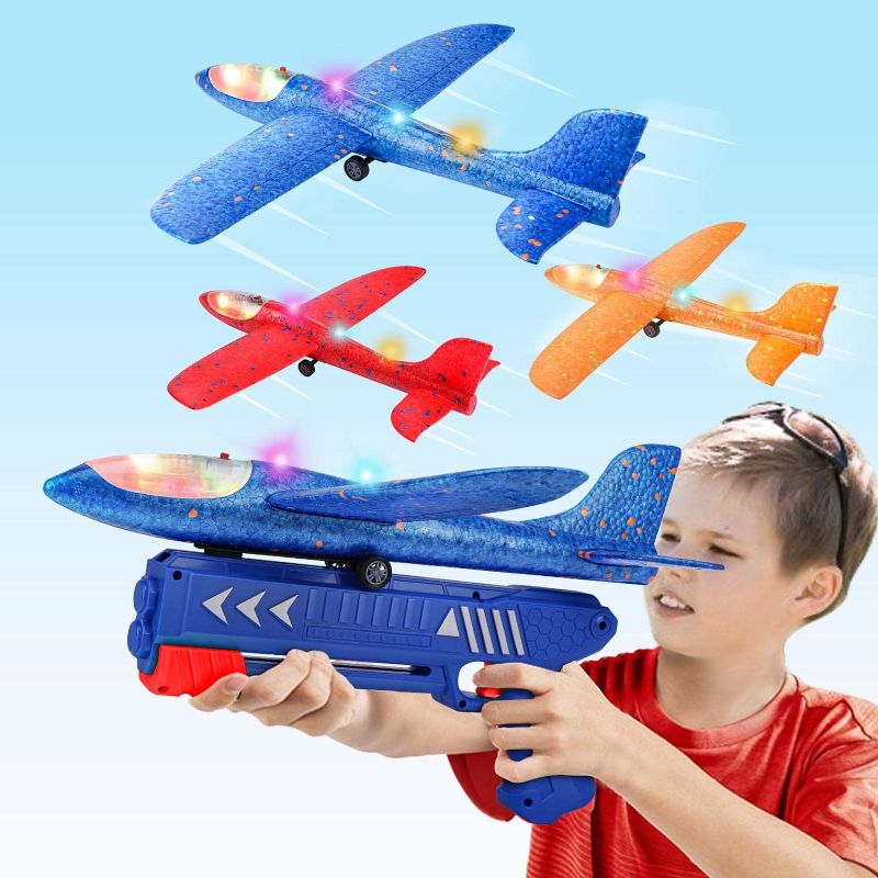 Photo 1 of 3 Pack Airplane Launcher Toy, 12.6" Foam Glider Led Plane, 2 Flight Mode Catapult Plane for Kids Outdoor Sport Flying Toys Gifts for 4 5 6 7 8 9 10 12 Year Old Boys Girls