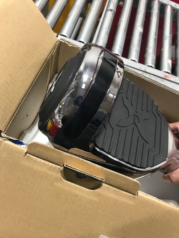 Photo 1 of Hover-1 Matrix Electric Self-Balancing Hoverboard with 6.5” LED Tires, Color-Changing Fender Lights, Dual 150W Motors, 7 mph Max Speed, and 3 Miles Max Range Gun Metal