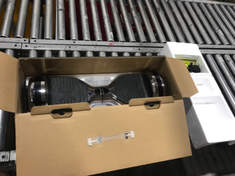 Photo 1 of Hover-1 Matrix Electric Self-Balancing Hoverboard with 6.5” LED Tires, Color-Changing Fender Lights, Dual 150W Motors, 7 mph Max Speed, and 3 Miles Max Range Gun Metal